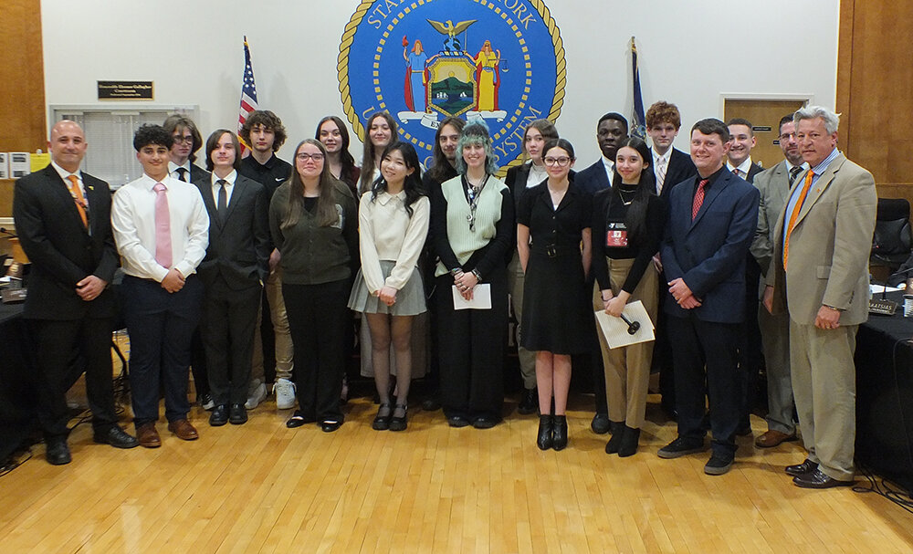 Social Studies Teacher James Ventriglia recently brought members of his Youth in Government program to the Marlboro Town Board. Pictured L-R James Ventriglia, Kathem Fakhoury, Sam Armstrong, Noah Ernst, Robert Kunkel, Gia Faricellia, Julia Gaer, Abby Gaer, Audrey Lee, Kyle Anderson, Eva Carbone, Olivia Ciaccio, Zoi Kosta, Lucy Canizzaro, Feranmi Mabinuori, Nathaniel Pascale, teacher/advisor Kevin Egan, Harrison Solomon, Marlboro Superintendent Michael Rydell and Board of Education President Michael Connors.